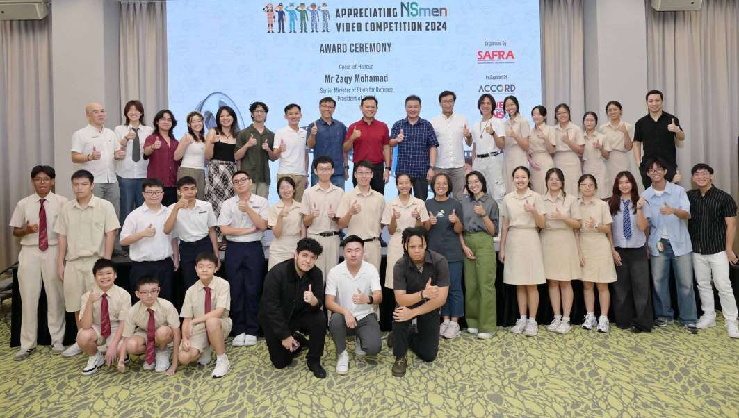 Group photo of students and organisers at the Appreciating NSmen Video Competition award ceremony.