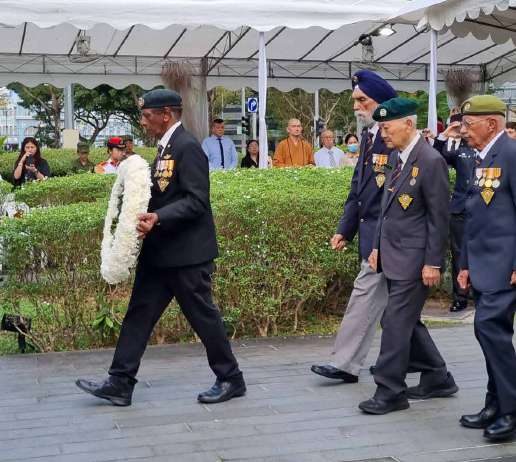 SAF Veterans' League representatives in ceremonial dress marching at the Remembrance Day Memorial Ceremony.